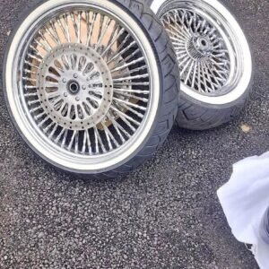 Chrome spokes wheels and white walls tires