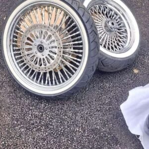Chrome spokes wheels and white walls tires
